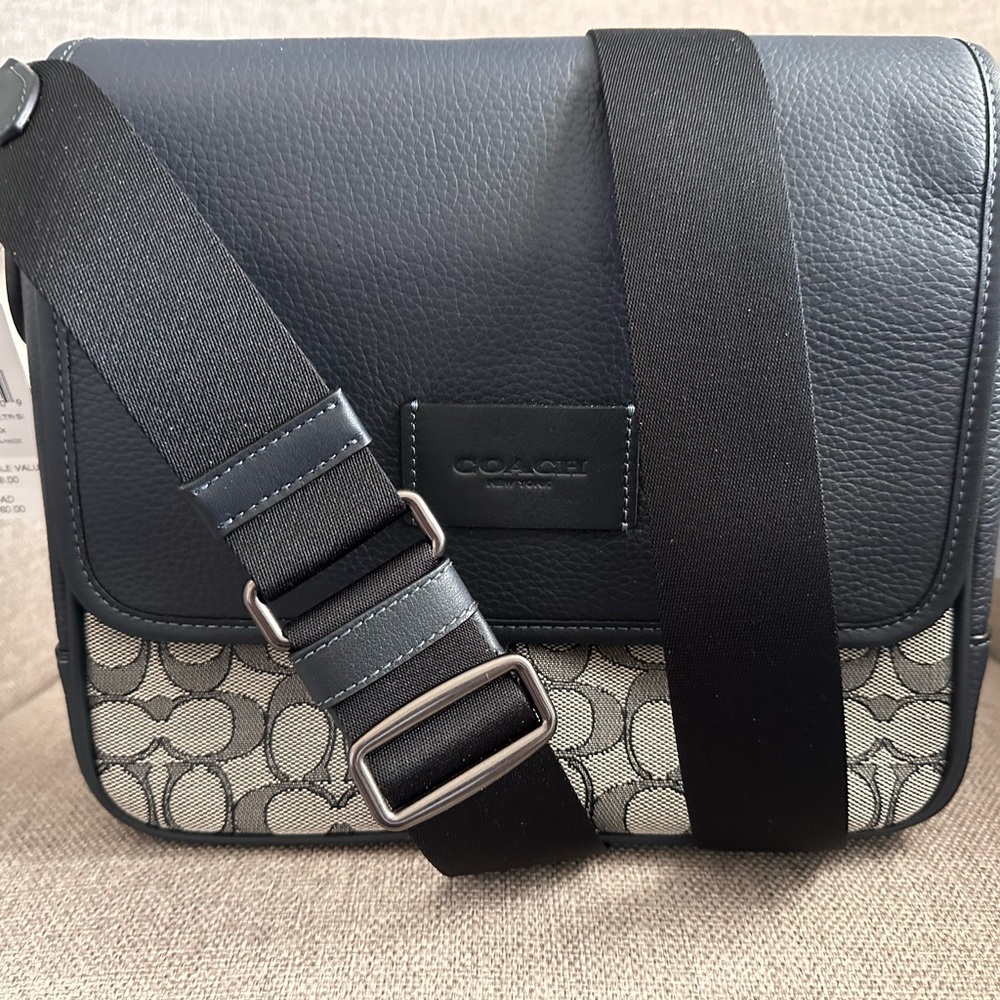 Coach men’s crossbody bag in navy.